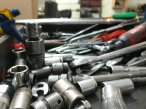 Wrenches and bits on a work table