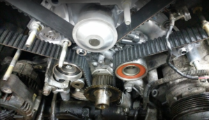 Changing the timing belt on a V8 engine.
