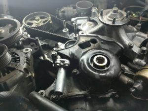 The interior view of a Toyota V8 engine, showing the timing belt.